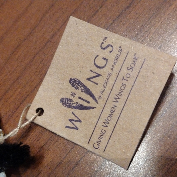 Alexa's Angels pull string Clasp bracelet. - Picture 4 of 9